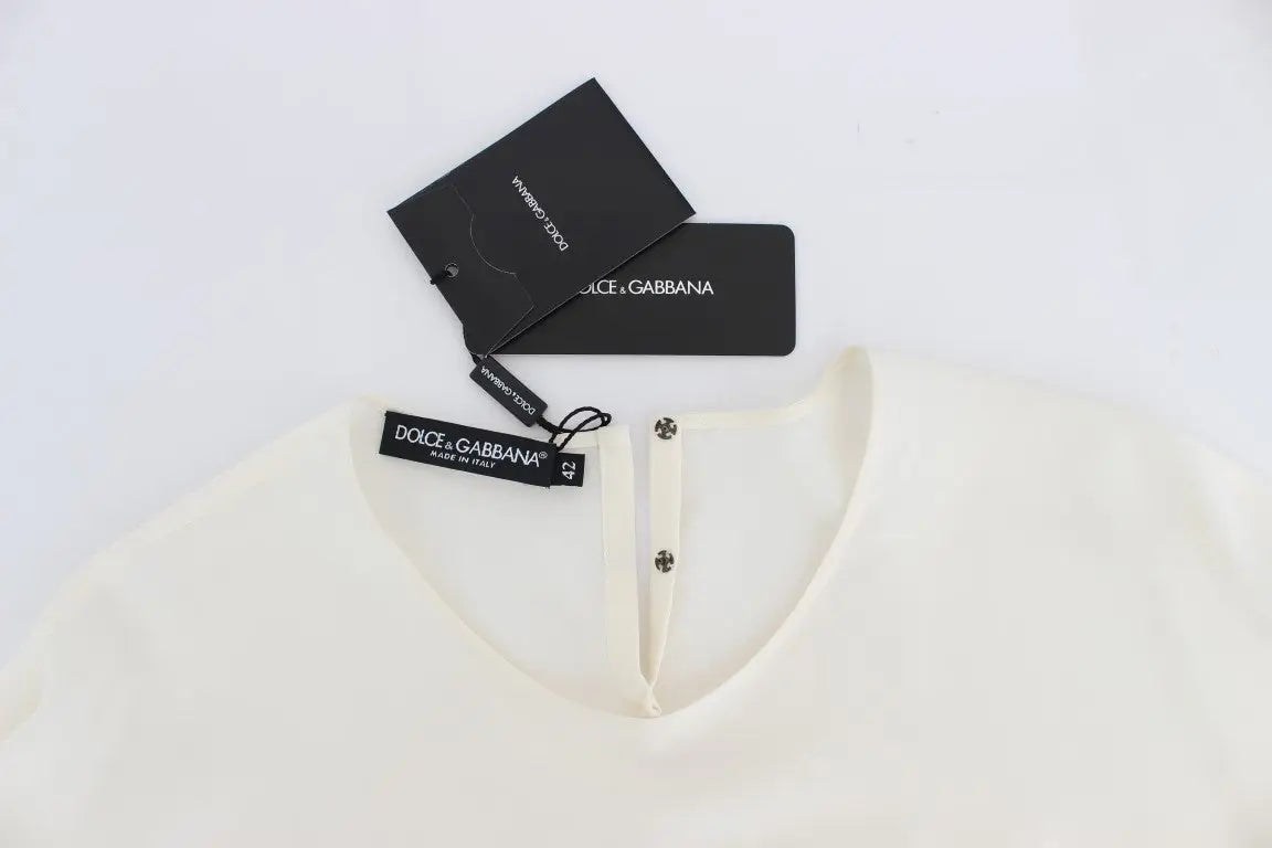 Blouse dolce & gabbana en soie blanche avec sequins et boutons subtils au col couleur crème fluide