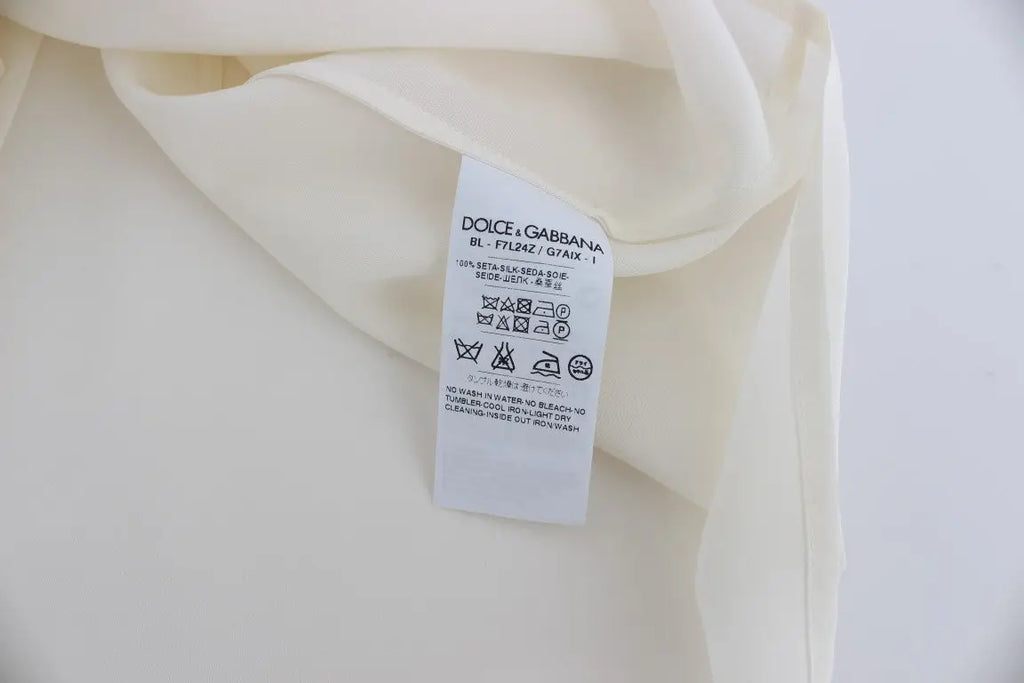 Étiquette crème dolce & gabbana pour blouse blanche en soie clé à sequins et t-shirt top