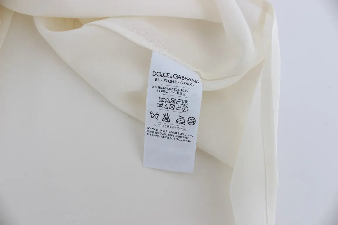 Étiquette crème dolce & gabbana pour blouse blanche en soie clé à sequins et t-shirt top