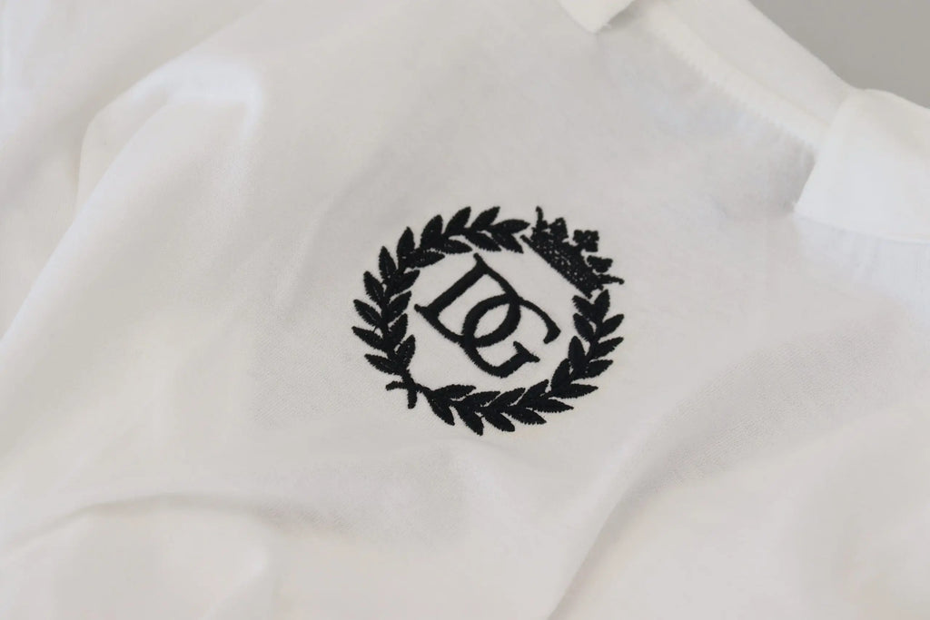 Polo blanc en coton dolce gabbana avec logo noir brodé dc entrelacé entouré de couronnes de laurier sur le devant