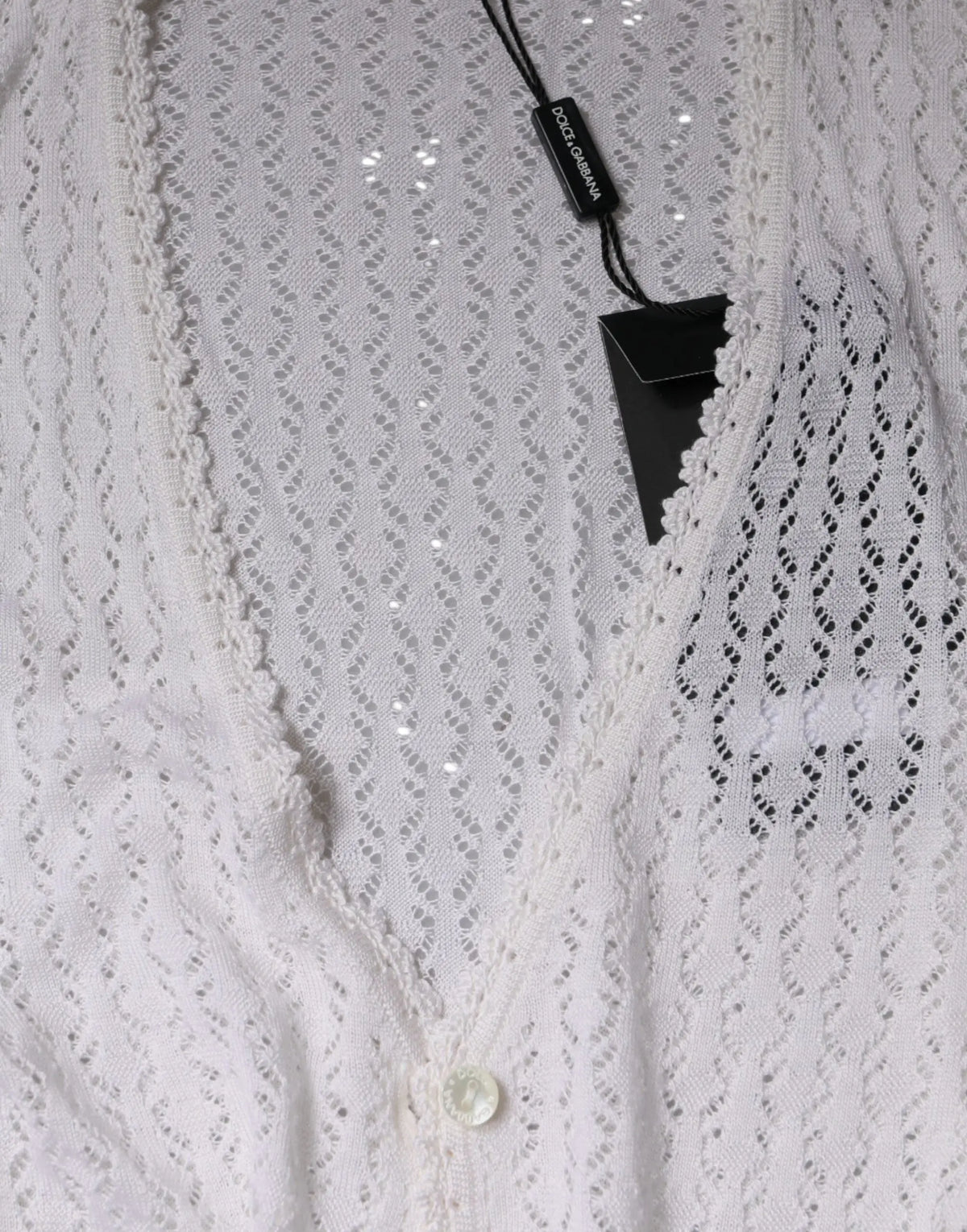 Cardigan blanc dolce et gabbana en soie avec boutons, dentelle délicate et léger effet scintillant