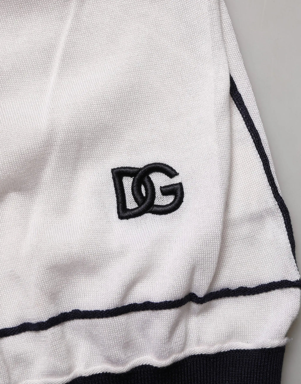 Veste de sport en maille blanche dolce gabbana avec logo dg brodé noir et bandes latérales assorties
