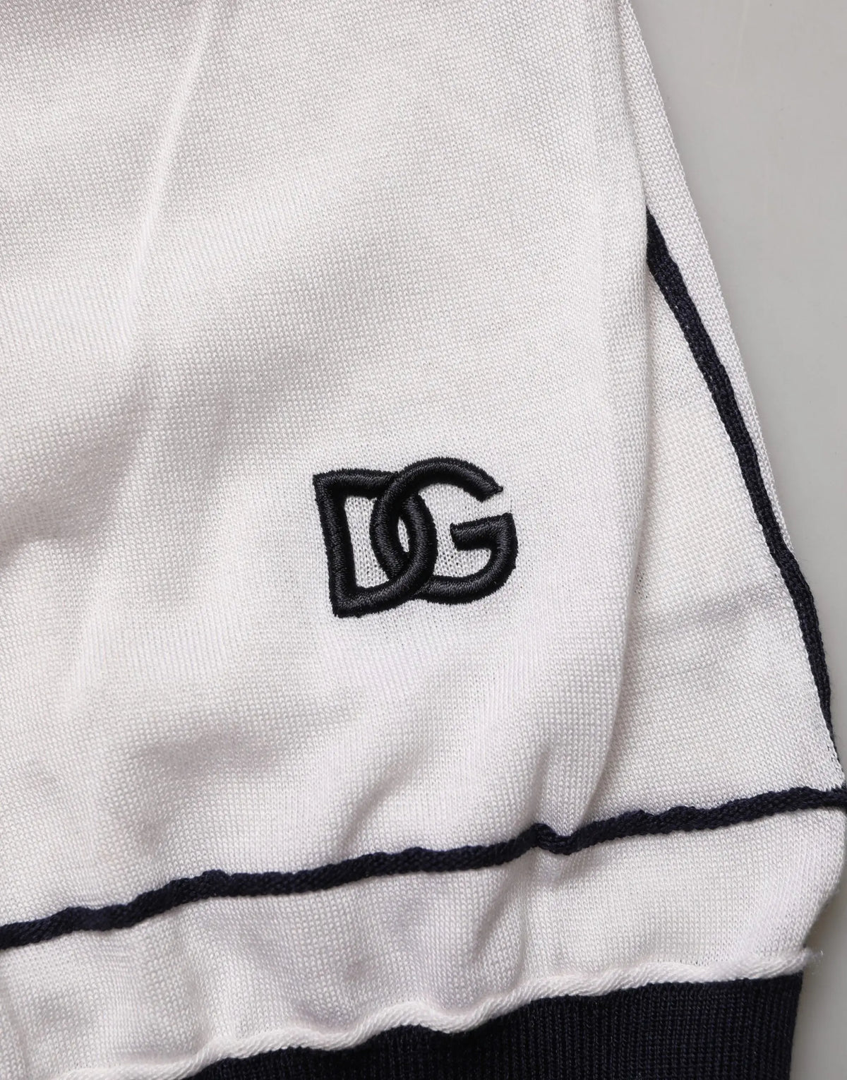 Veste de sport en maille blanche dolce gabbana avec logo dg brodé noir et bandes latérales assorties
