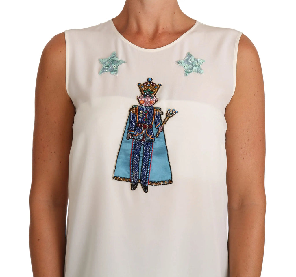 Dolce & gabbana t-shirt blanc en soie avec top sans manches orné d un nutcracker perlé bleu et or avec étoiles vert clair sequins
