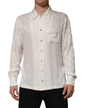 Chemise blanche en soie dolce & gabbana avec motif logo dg à manches longues et col classique semi-transparent délicat