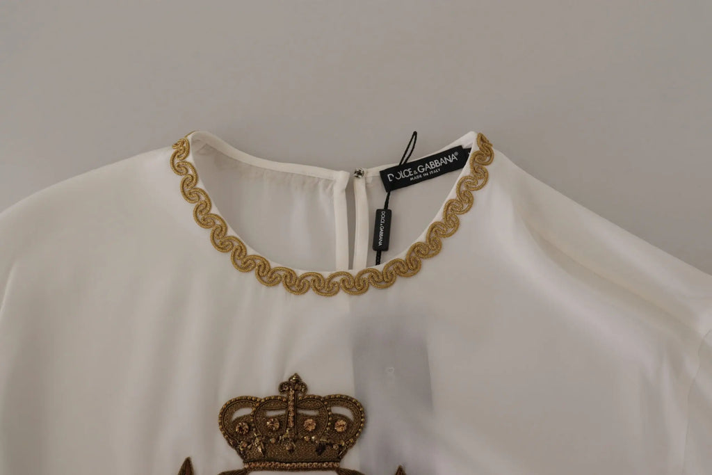 Blouse blanche dolce & gabbana en soie avec col festonné brodé or et appliqué couronne orné