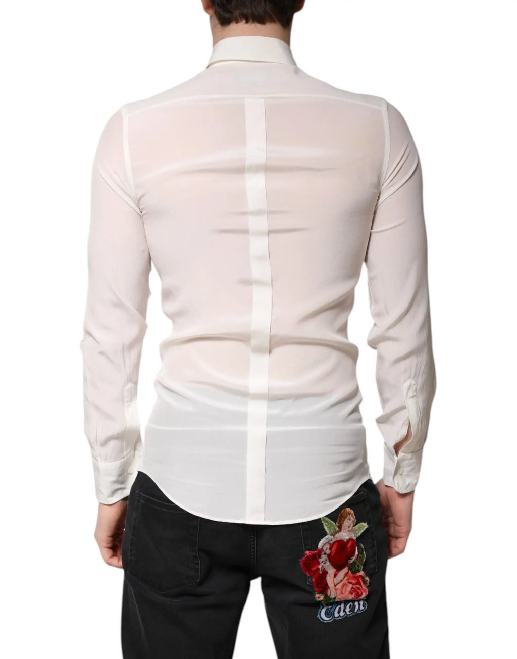 Vue arrière d’une chemise blanche en soie dolce & gabbana à manches longues avec une rose rouge brodée