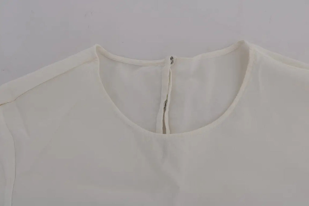 Blouse dolce & gabbana blanche en soie douce avec un léger éclat et un col rond simple