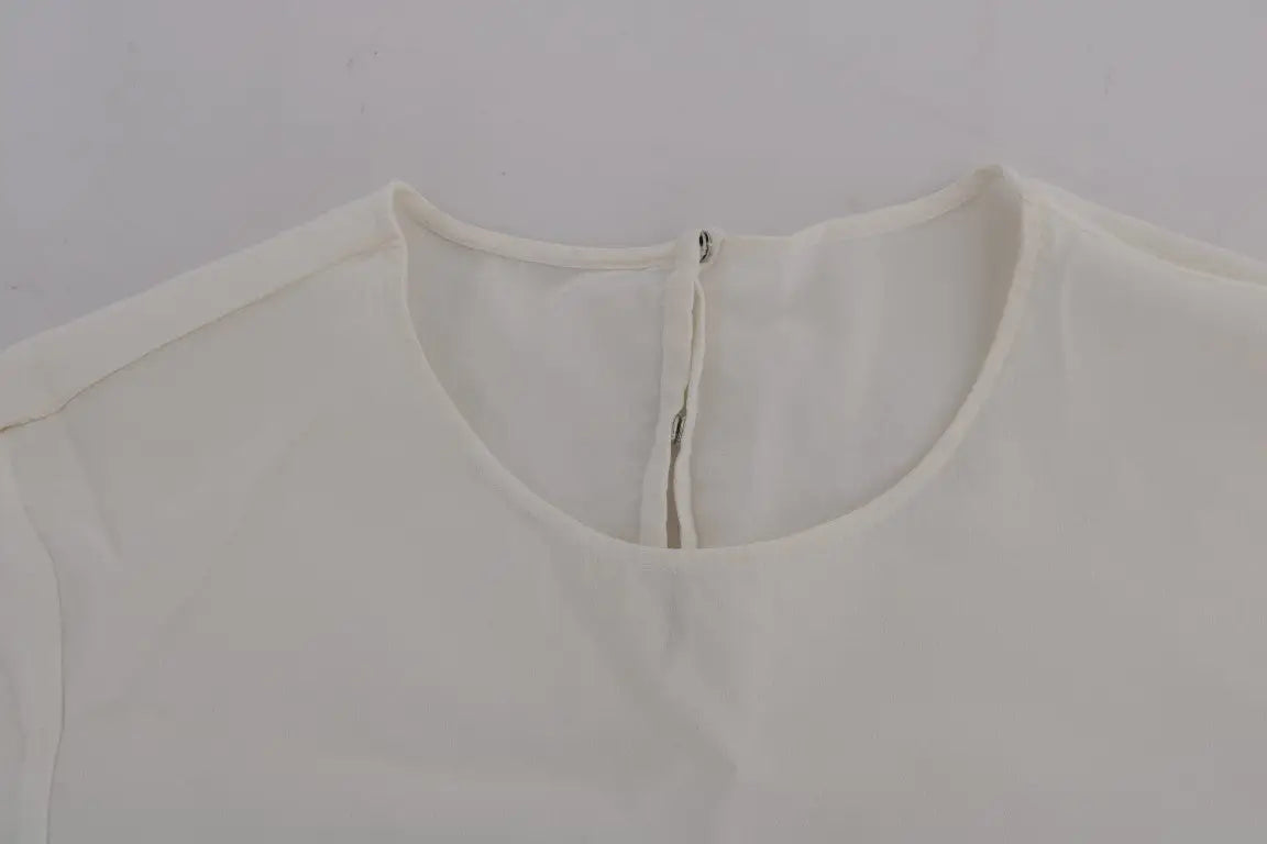 Blouse dolce & gabbana blanche en soie douce avec un léger éclat et un col rond simple