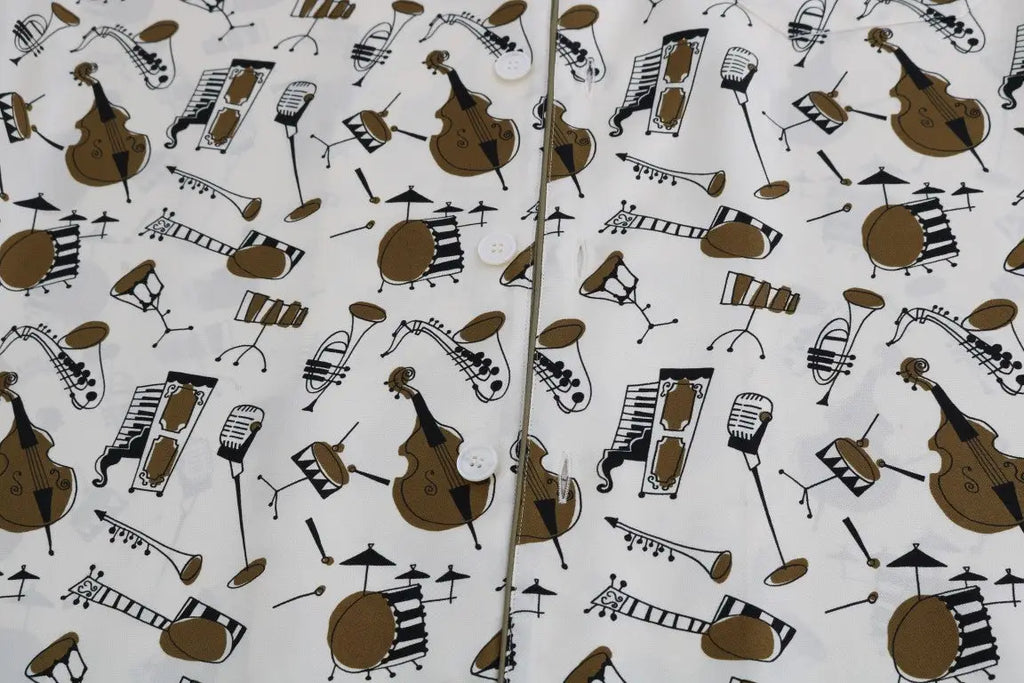 Chemise blanche dolce & gabbana en soie avec imprimé jazz d instruments de musique marron et noir