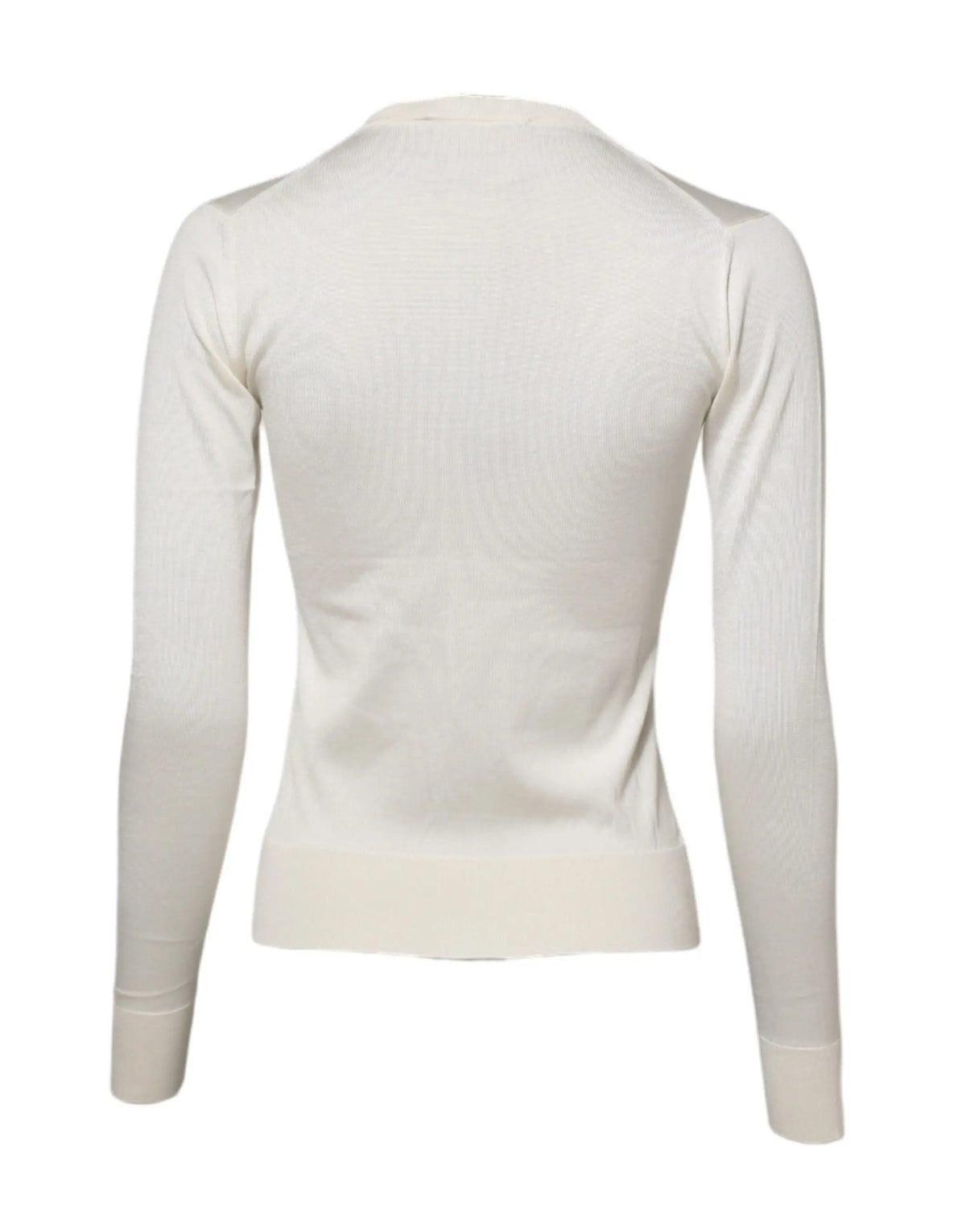 Cardigan dolce & gabbana blanc en soie avec embellissements lys porté sur un top en maille côtelée crème manches longues