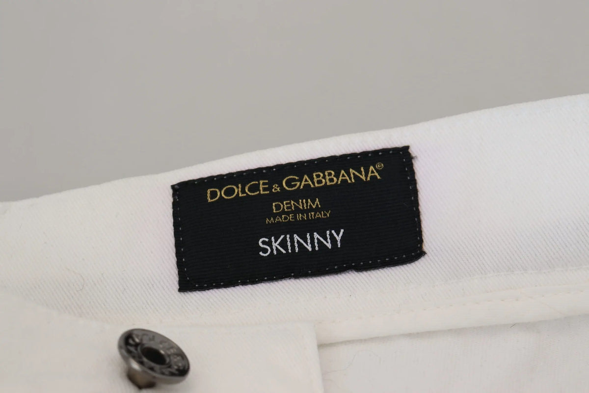 Étiquette noire rectangulaire dolce gabbana denim made in italy sur jean blanc slim skinny en coton stretch