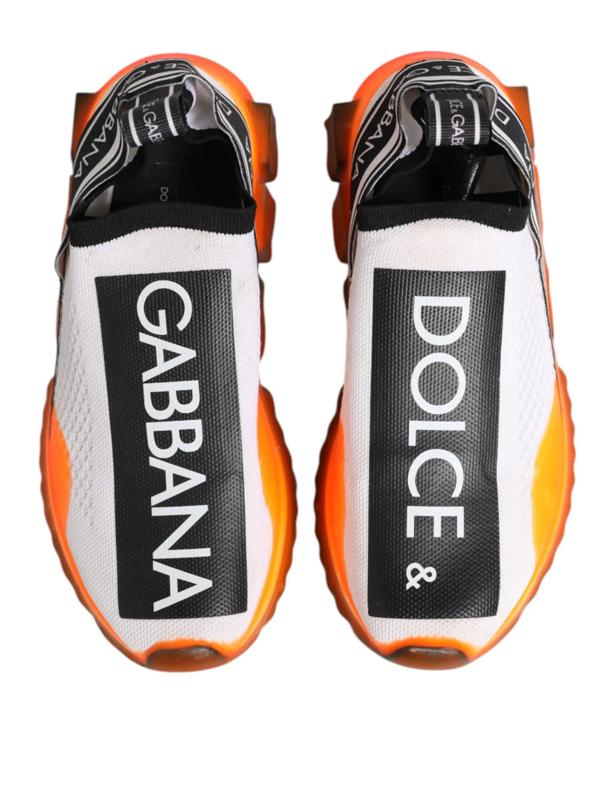 Dolce & gabbana white sorrento slip on low top sneakers with white and orange leather and bold black branding panels
