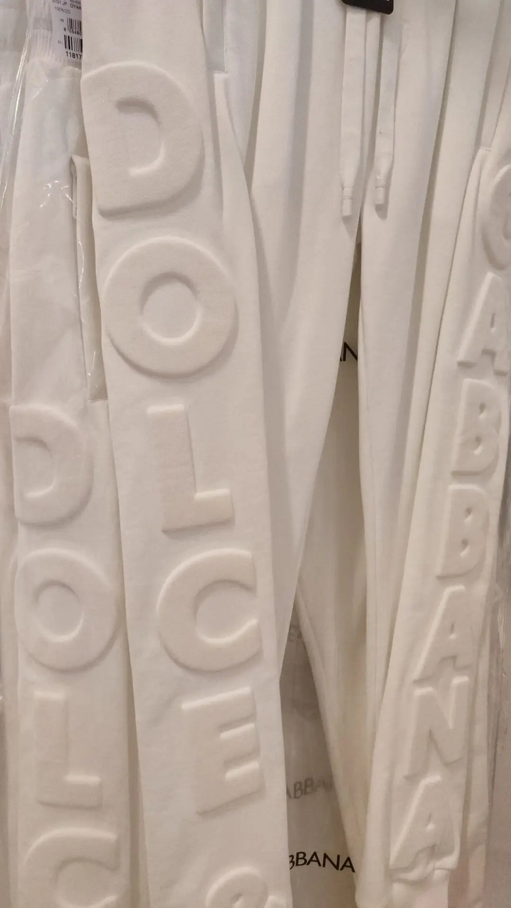 Pantalon de survêtement blanc dolce & gabbana en coton avec lettrage embossé sur le côté sport