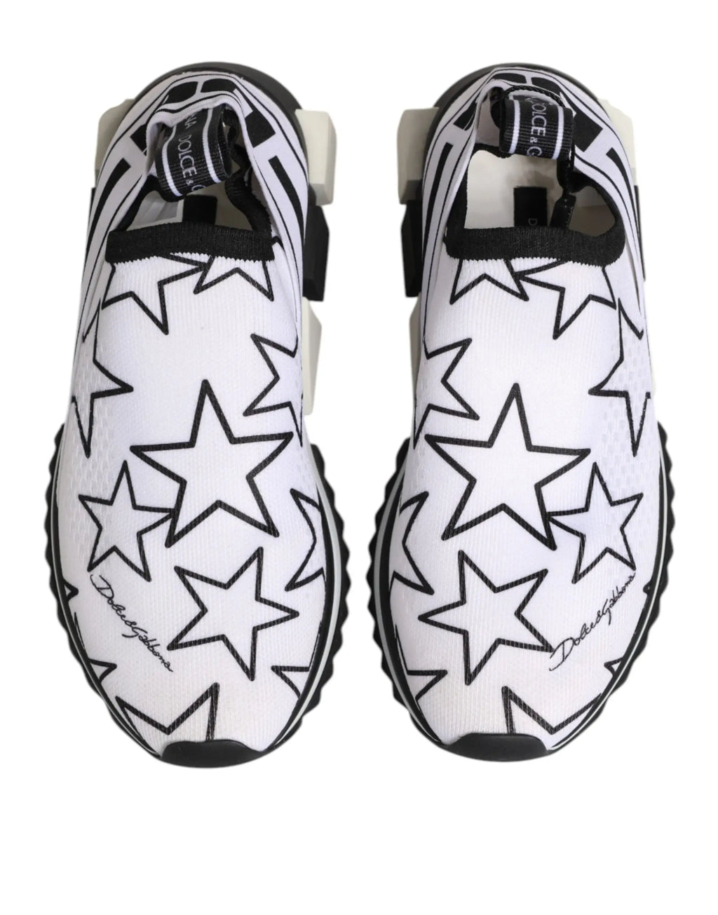 Baskets basses dolce & gabbana blanc avec motifs étoiles noirs logo signature empeigne élastiquée semelle épaisse