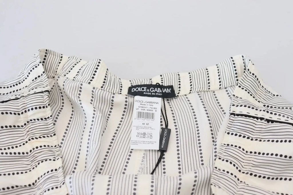 Pantalon de détente en soie dolce & gabbana blanc à rayures noires verticales avec lignes en pointillés et étiquette visible
