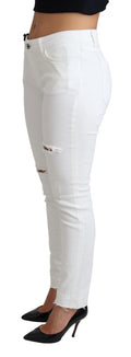 Jean skinny blanc déchiré dolce gabbana en coton stretch taille haute avec ourlets effilochés