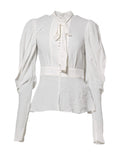 Blouse blanche dolce gabbana en viscose avec manches bouffantes col ascot et bas peplum noué