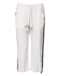 Pantalon de jogging blanc dolce & gabbana en viscose avec bandes latérales noires à texte répété et taille à cordon