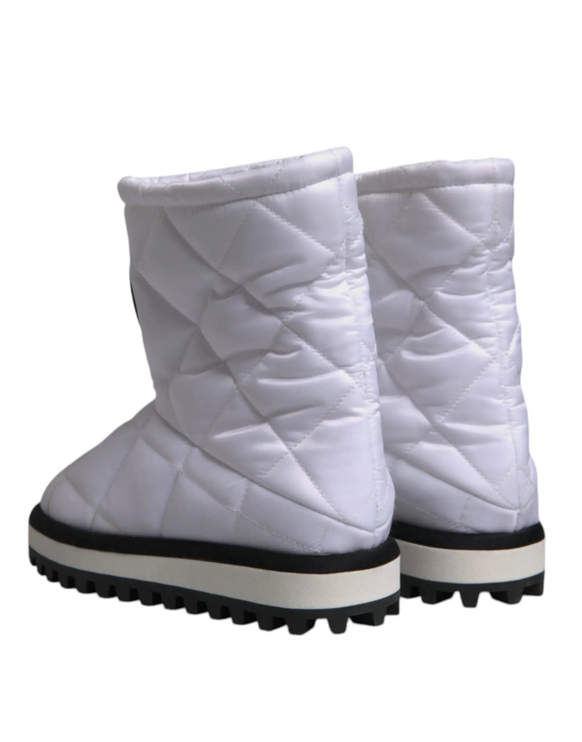 Dolce & Gabbana bottes mi-mollet matelassées en viscose blanches avec semelle en caoutchouc noir et crème