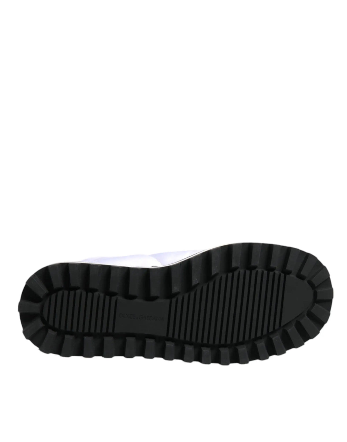 Semelle en caoutchouc noir avec motif profond et rainuré des bottes blanches en viscose matelassée mi-mollet dolce gabbana