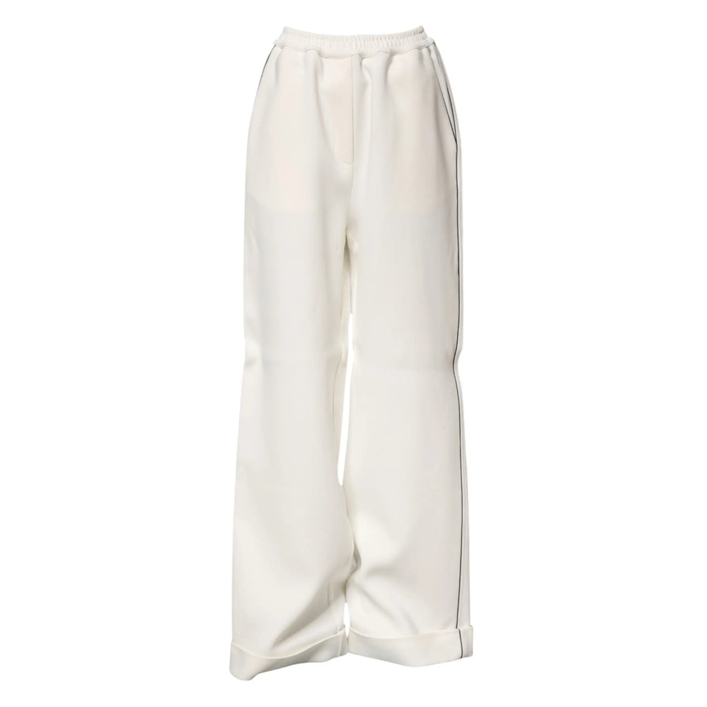 Pantalon large blanc dolce & gabbana en viscose avec tissu fluide crème et fines bandes noires sur les côtés