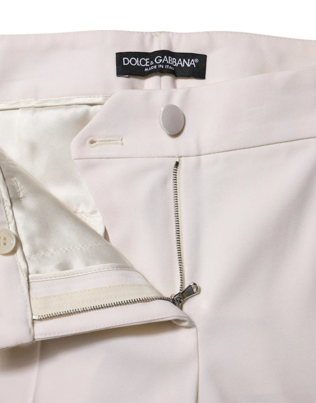 Pantalon blanc dolce & gabbana en laine avec taille mi-haute coupe fuselée et zips métalliques élégants