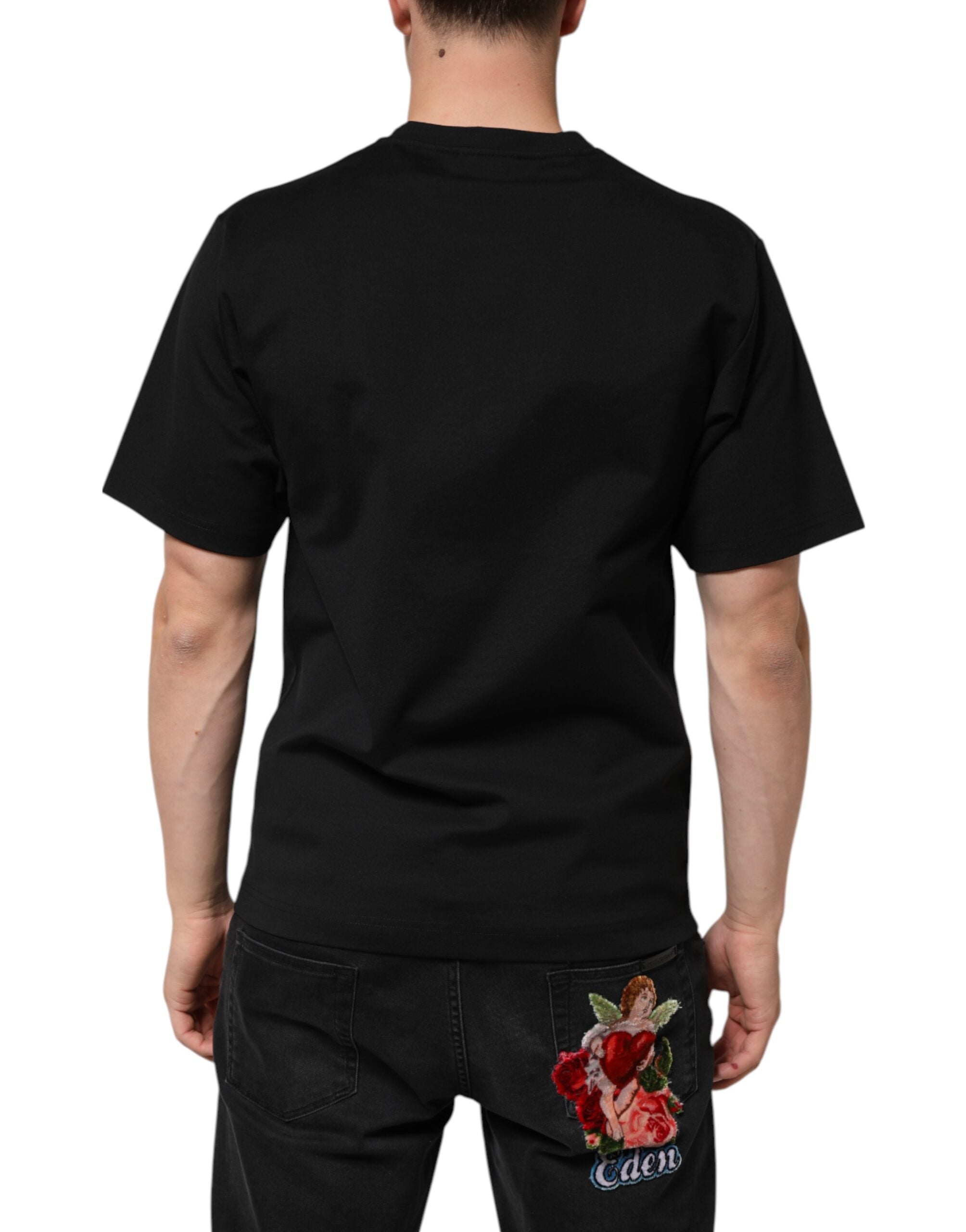 T-shirt à manches courtes noir Dolce & Gabbana en coton avec logo DG et motif graffiti, vue de face.