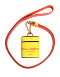 Pochette cylindrique jaune dolce & gabbana en cuir de veau avec logo rouge noir et métal doré pour airpods
