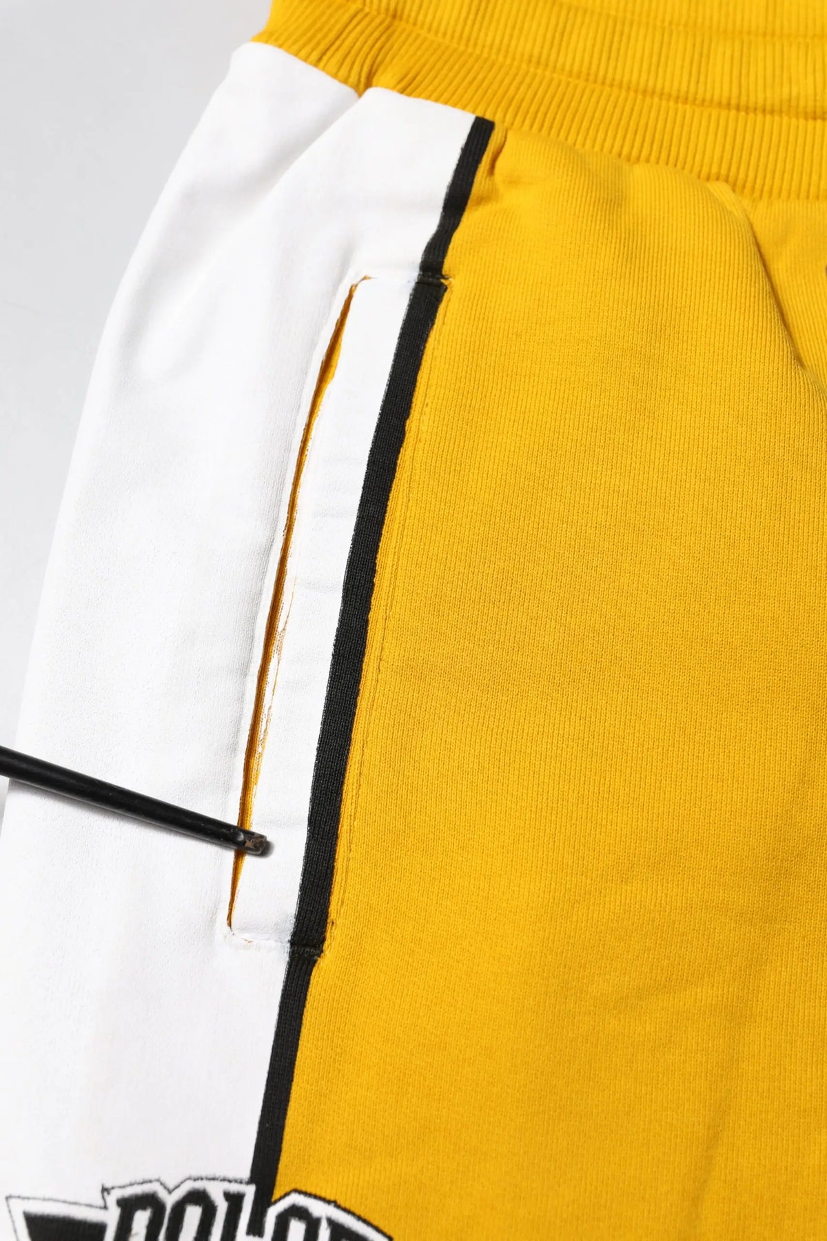 Pantalon de jogging dolce & gabbana en coton jaune et blanc avec taille côtelée et poches latérales noires