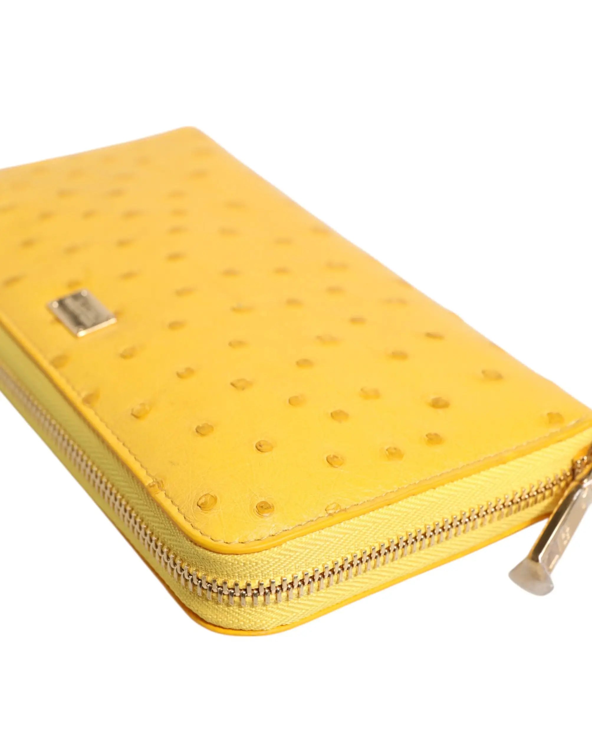 Portefeuille continental zippé dolce & gabbana jaune en cuir estampé autruche avec fermeture éclair dorée et fermoir métallique