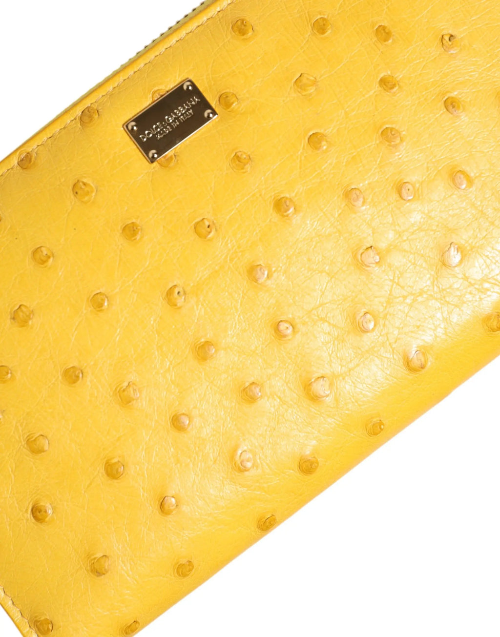 Clutch jaune vif en cuir dautruche avec plaque métallique dolce gabbana
