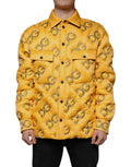 Veste matelassée jaune dolce gabbana avec motif logo dg métallisé gris sur toute la surface