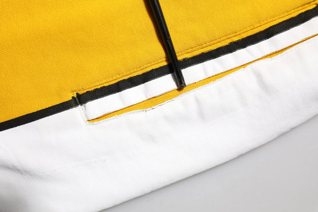 Sac cabas en toile jaune et blanc avec bordure noire assorti au pantalon jogger à cordon en coton dolce & gabbana jaune imprimé