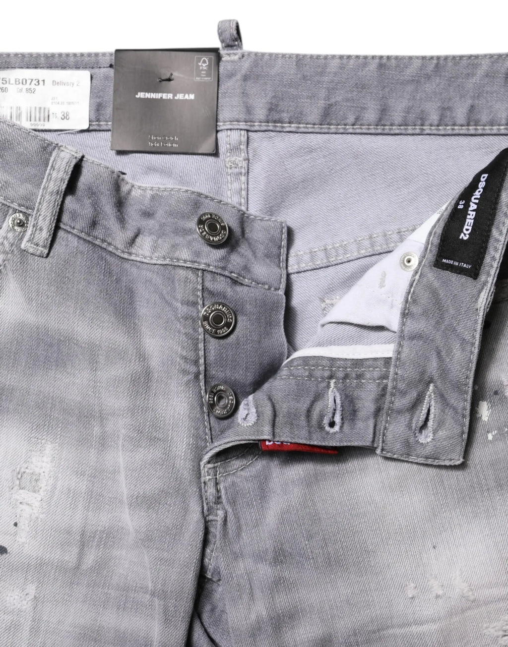Jean en denim gris délavé dsquared² mi taille avec jambes fuselées boutons apparents et étiquettes de marque