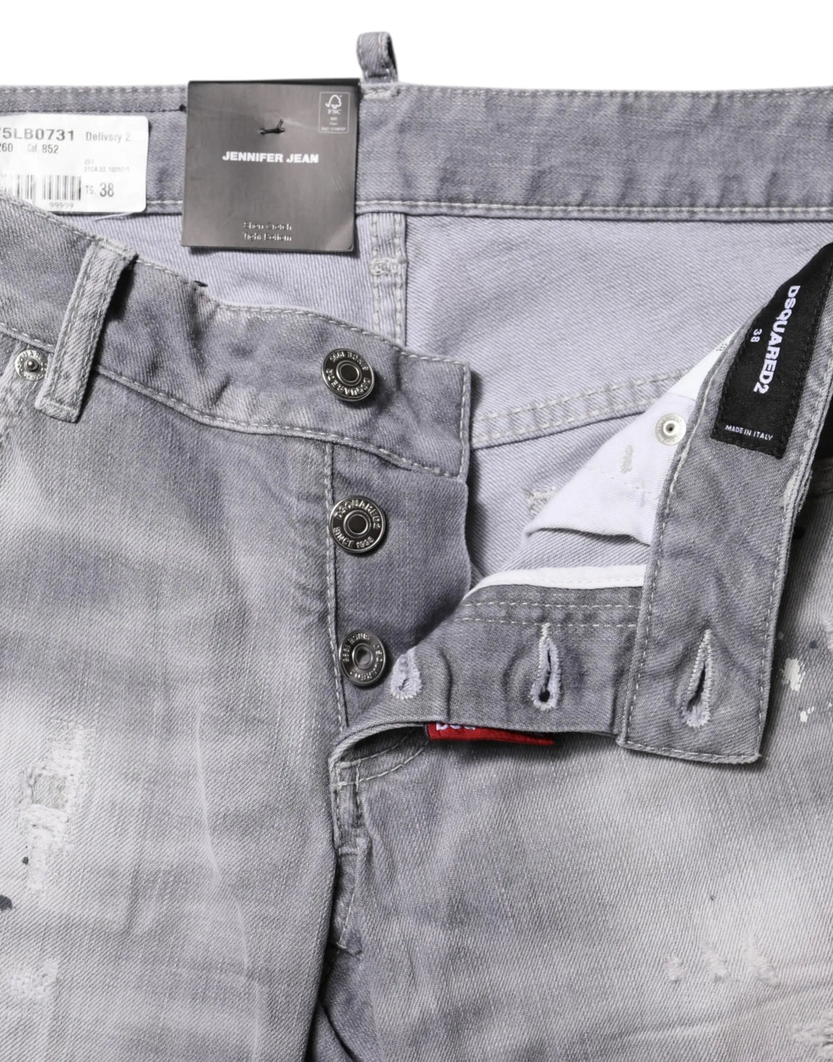 Jean en denim gris délavé dsquared² mi taille avec jambes fuselées boutons apparents et étiquettes de marque