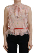 Dsquared² blouse en soie rose avec imprimé floral, manches et col volantés et ceinture rouge vive