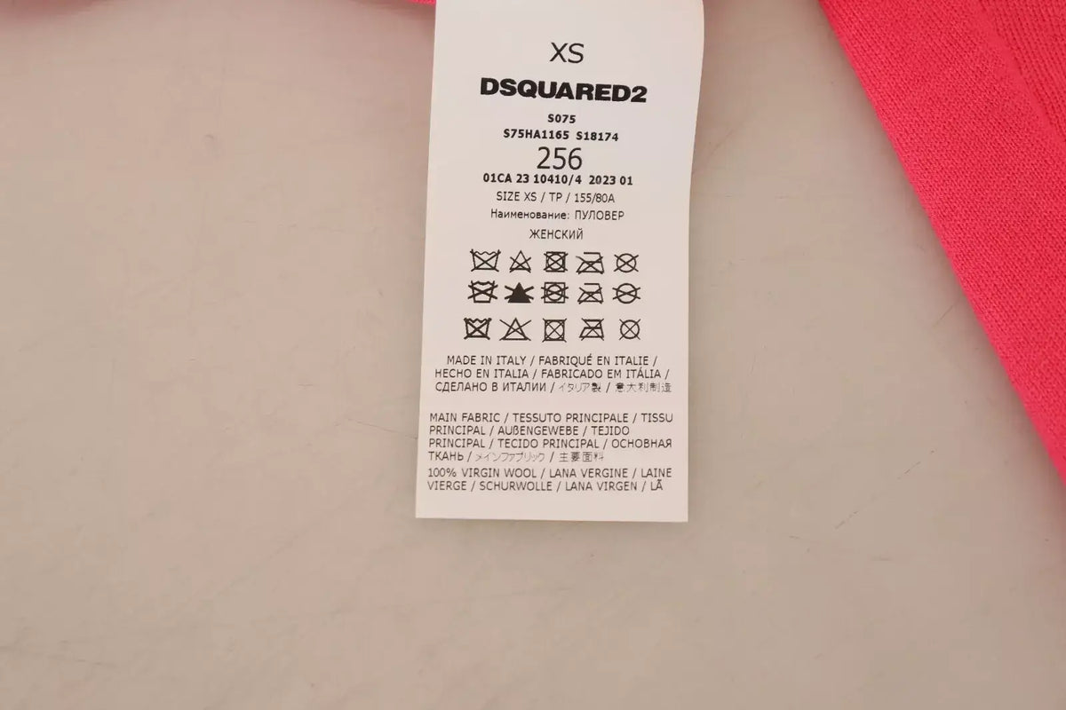 Étiquette de soin dsquared² blanche indiquant taille xs 100 pour cent laine vierge made in italy pour pull col roulé rose manches longues