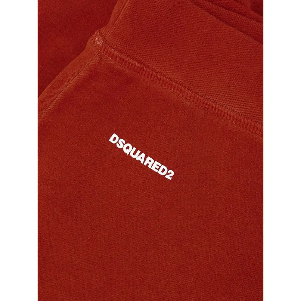 Un sweat dsquared2 couleur rouille en coton avec col côtelé et logo brodé blanc assorti au pantalon de sport rouge