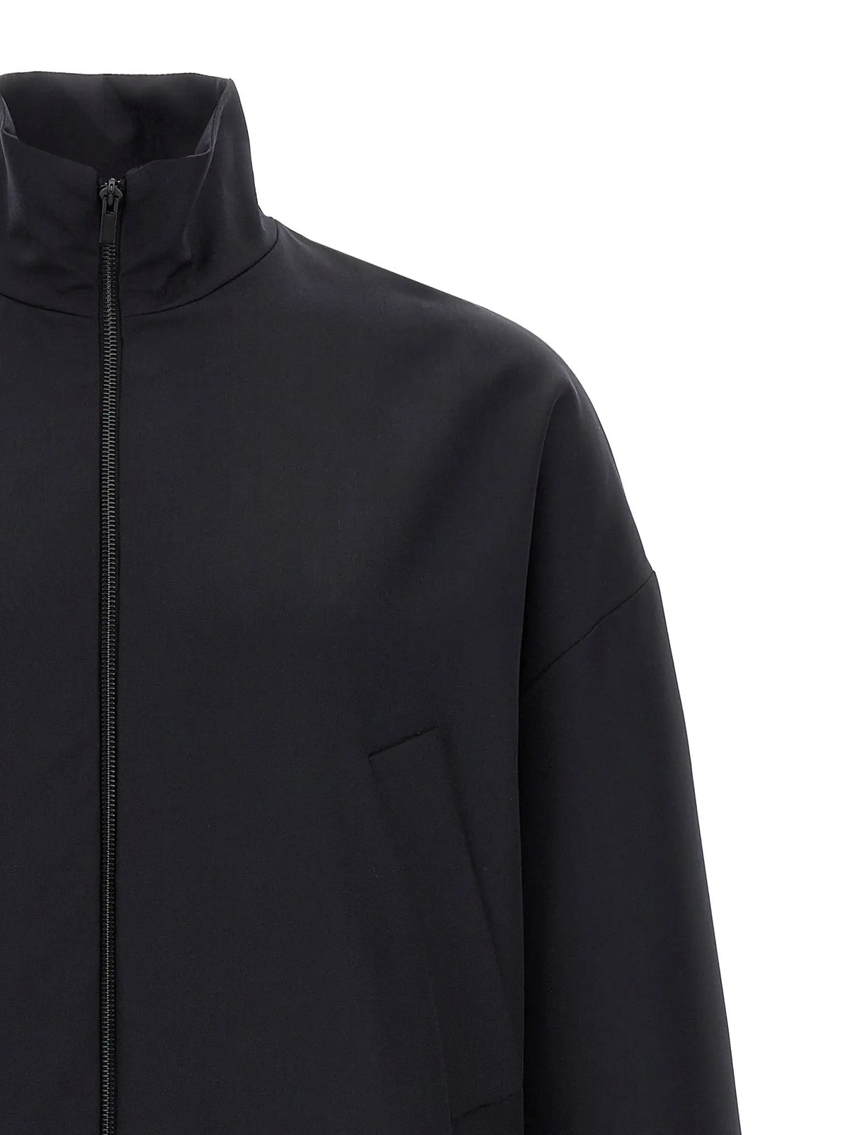 Veste noire zippée fear of god en laine vierge bleu avec design minimaliste et tissu lisse