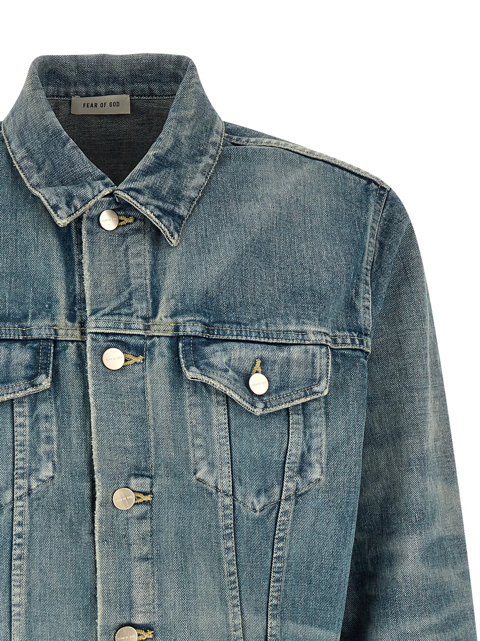 Veste en jean en coton bleu Fear Of God, style décontracté avec col et boutons, vue de face.