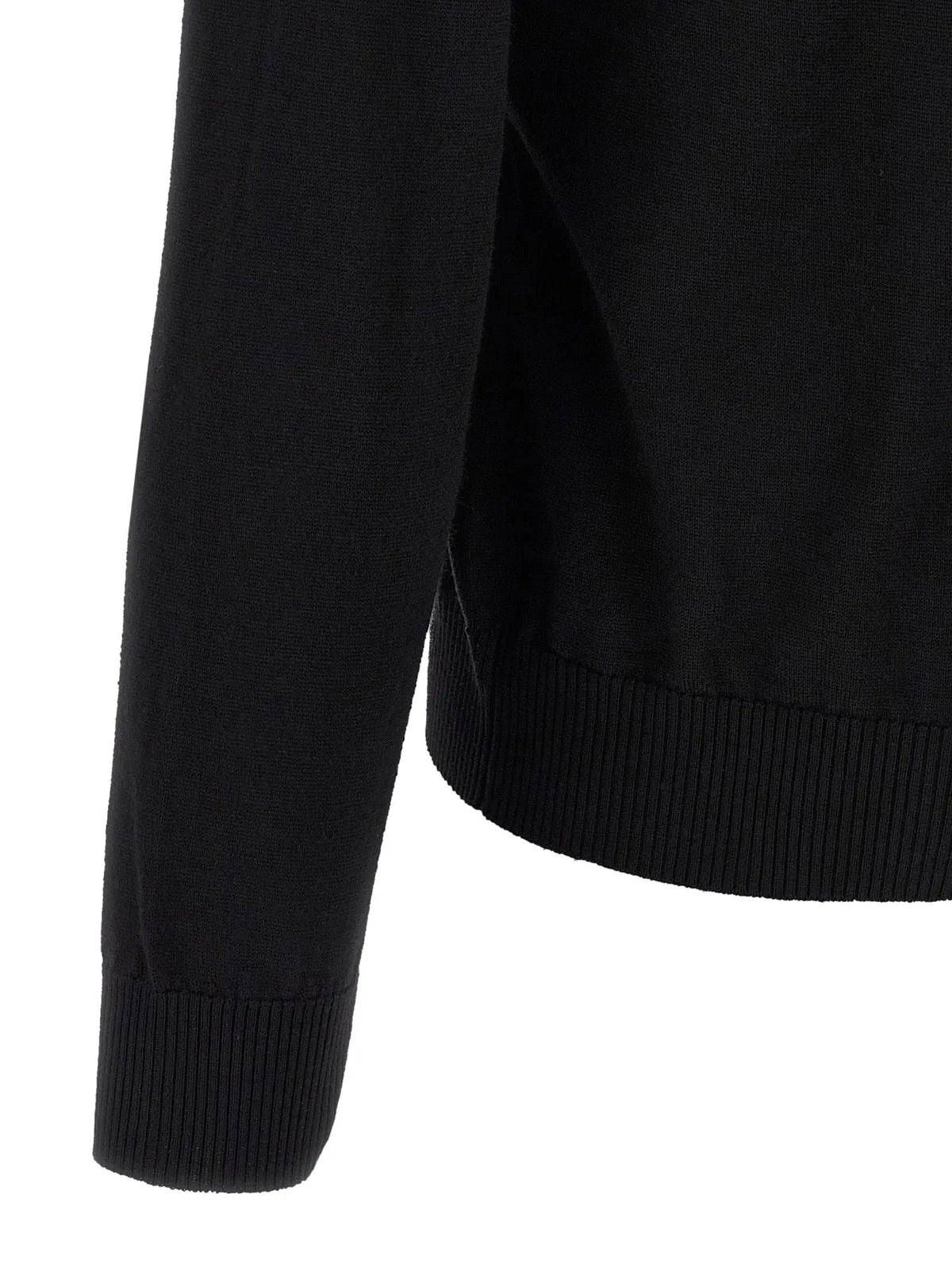 Manche de cardigan fendi noir en laine vierge côtelée avec texture lisse et poignets finement finis