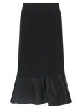Jupe midi noire en laine vierge de Fendi, plissée et élégante, visible dans l'image.