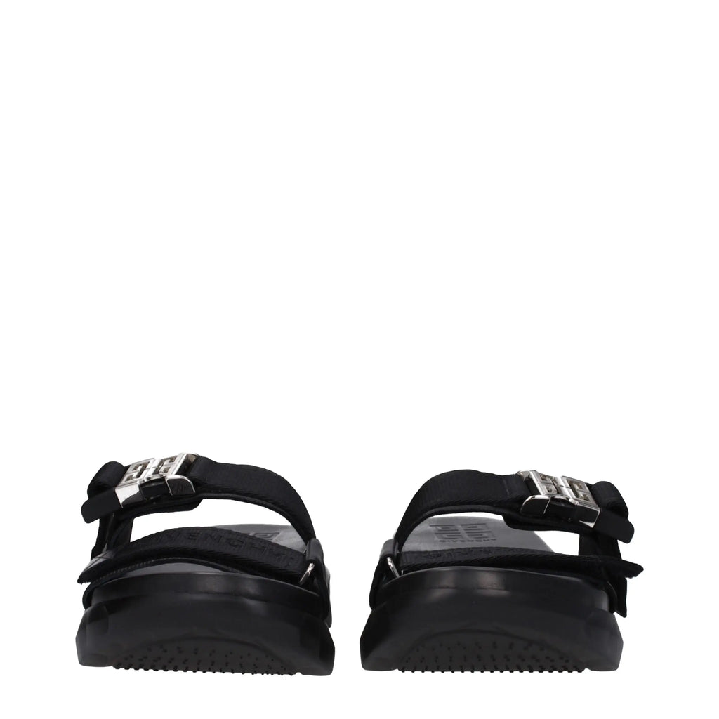 Givenchy slippers noirs en tissu avec semelle plateforme et boucles argentées