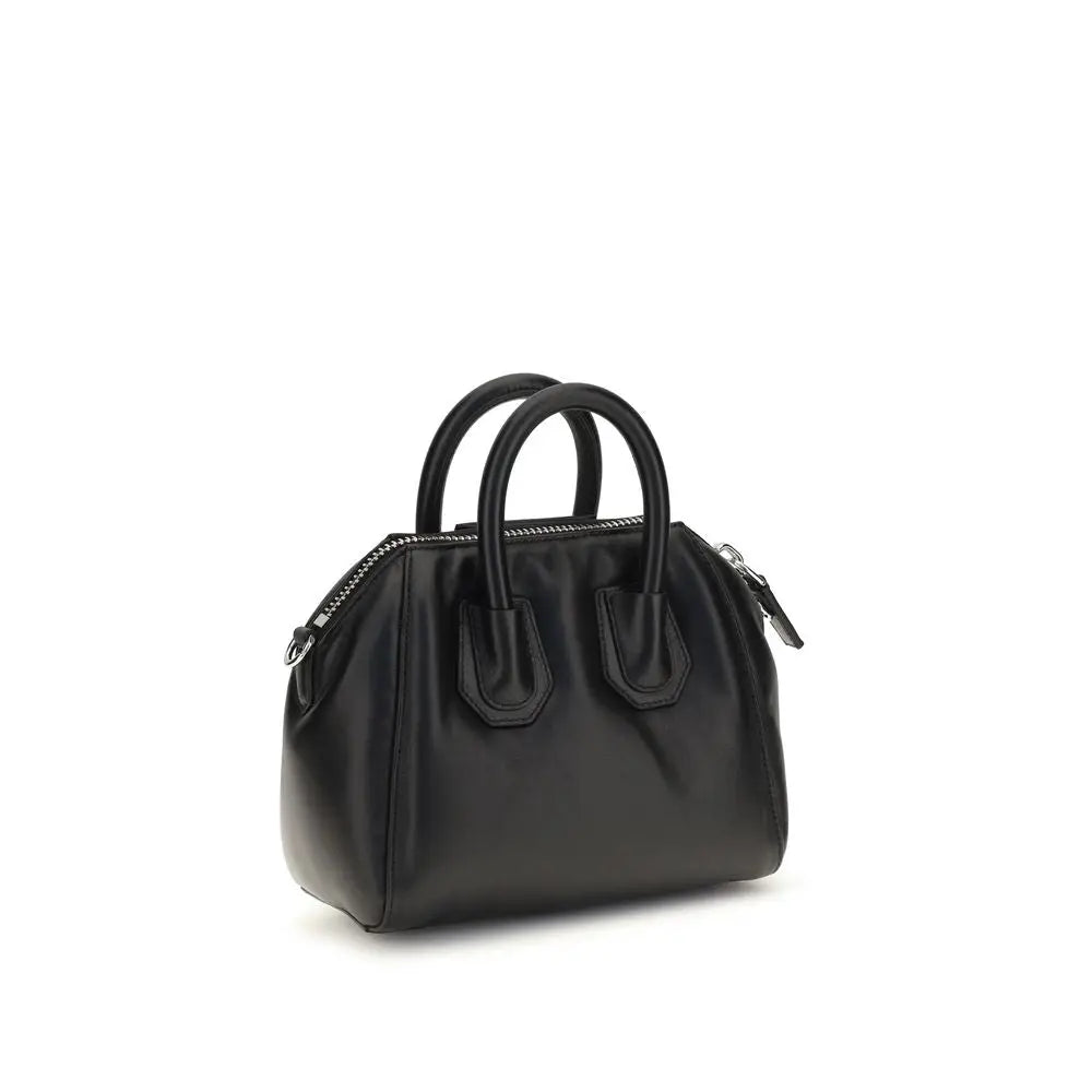 Sac à main givenchy antigona mini noir en cuir agneau avec silhouette structurée et poignées supérieures
