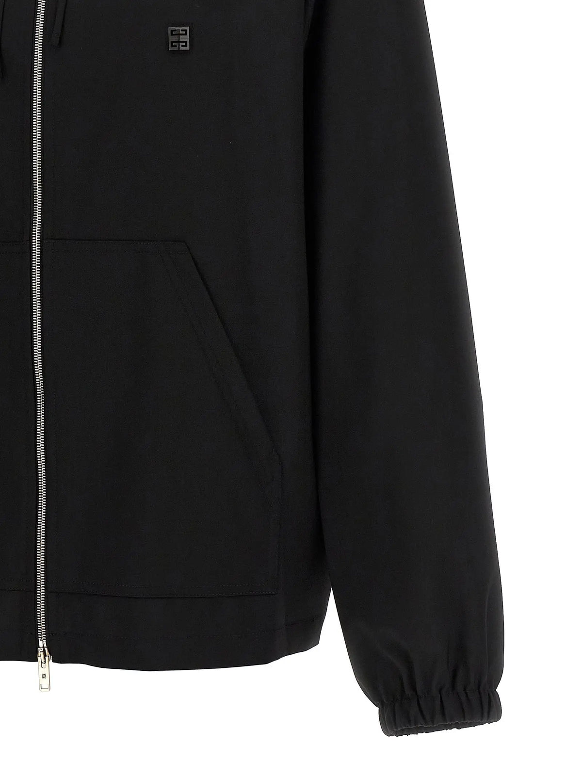 Givenchy sweat noir en laine vierge avec fermeture éclair argentée et patch logo subtil sur la poitrine