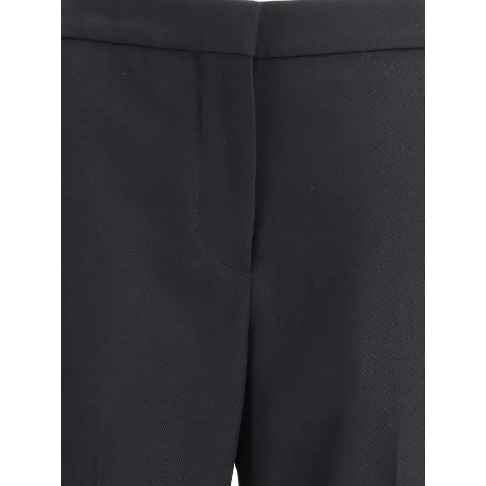 Pantalon givenchy noir en laine avec tissu structuré et couture nette à la taille