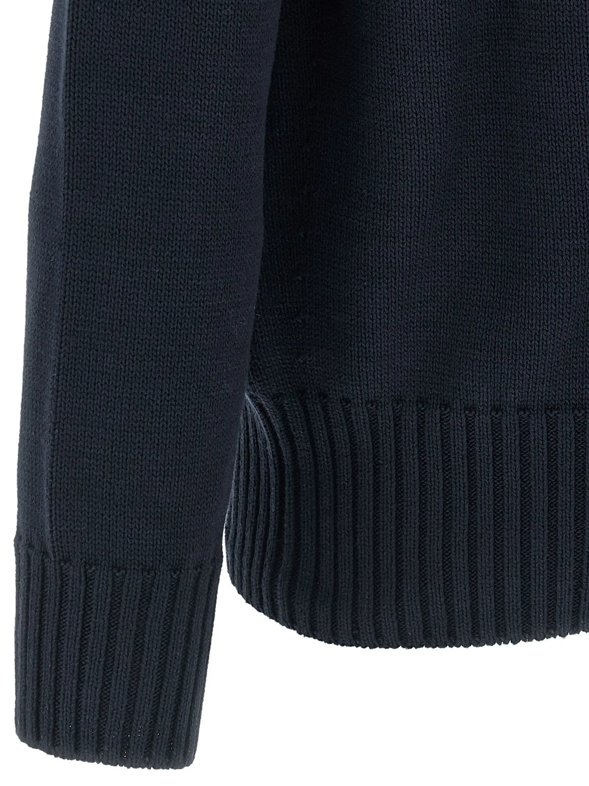 Manche de cardigan en coton bleu givenchy en maille côtelée bleu marine foncé avec finition texturée sans couture