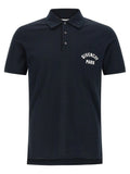 Polo Givenchy en coton bleu avec logo brodé blanc sur la poche poitrine, style élégant et décontracté