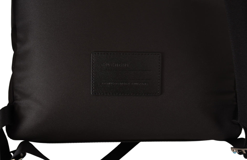 Sac à dos urbain en nylon rouge et noir Givenchy, design moderne avec poignées et compartiments visibles.
